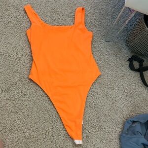 orange bodysuit